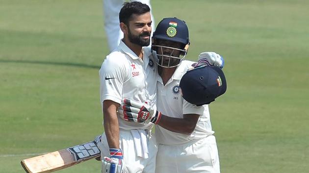 Virat Kohli and Wriddhiman Saha on the second day of India vs Bangladesh Test in Hyderabad on Friday.(AFP)