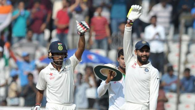 India's Ravindra Jadeja and Wriddhiman Saha react on the second day of the Test cricket match between India and Bangladesh. (AFP) India's Ravindra Jadeja and Wriddhiman Saha react on the second day of the Test cricket match between India and Bangladesh. (AFP)