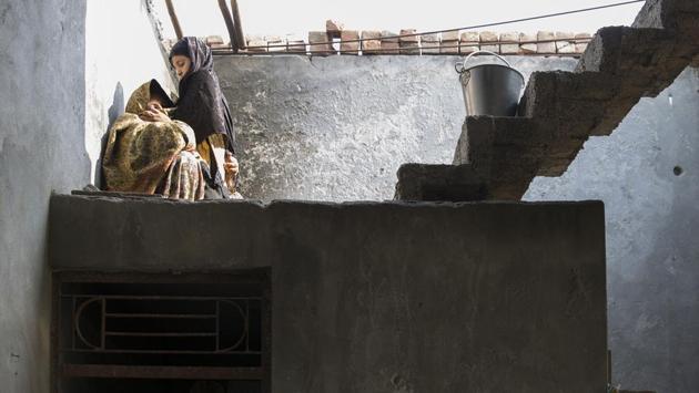 Fatima (name changed) earned Rs 3 a piece for stitching blankets during winter but that too is coming to an end. She says, “Indirectly, they send people to ask if we are willing to settle the case by taking some money. We decline their offers.” Her trial, which began in June 2015, is still in the evidence stage. (Ruhani Kaur for Amnesty International India/ HT Photo)