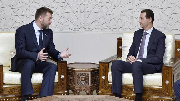 A picture released by the official Syrian Arab News Agency (SANA) on February 8, 2017 shows Syrian President Bashar al-Assad (centre right) meeting with a delegation from the Russian Duma, headed by Federation Council member Dmitry Sablin (centre left). (AFP Photo) A picture released by the official Syrian Arab News Agency (SANA) on February 8, 2017 shows Syrian President Bashar al-Assad (centre right) meeting with a delegation from the Russian Duma, headed by Federation Council member Dmitry Sablin (centre left). (AFP Photo)
