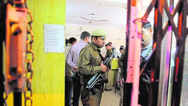 Gurgaon, India- February 09: Police officers investigate in Manappuram gold loan branch at new railway road, in Gurgaon, India, on Thursday, 09 February 2017. (Photo by Parveen Kumar/Hindustan Times) (Parveen Kumar/HT Photo) Gurgaon, India- February 09: Police officers investigate in Manappuram gold loan branch at new railway road, in Gurgaon, India, on Thursday, 09 February 2017. (Photo by Parveen Kumar/Hindustan Times) (Parveen Kumar/HT Photo)