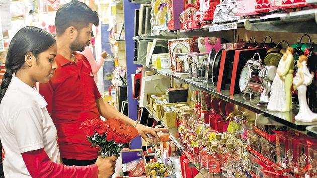 Customers looking for a Valentine gift at a shop in Mohali. (Sushil Prajapati/HT Photo)