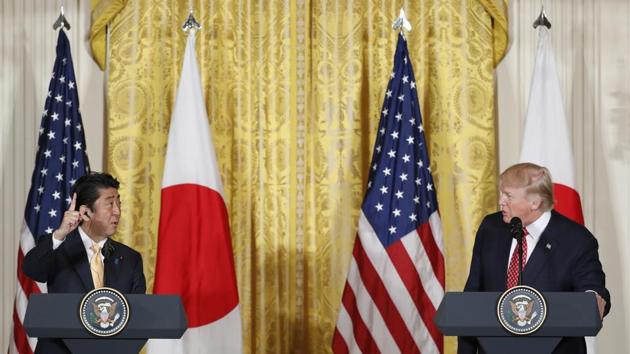 Japanese Prime Minister Shinzo Abe signals to President Donald Trump that he has one more questions to take from a member of the media during their joint news conference in the East Room of the White House in Washington, Friday, Feb. 10, 2017. (AP Photo) Japanese Prime Minister Shinzo Abe signals to President Donald Trump that he has one more questions to take from a member of the media during their joint news conference in the East Room of the White House in Washington, Friday, Feb. 10, 2017. (AP Photo)