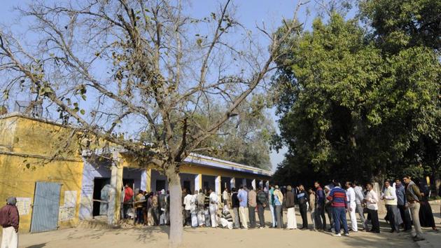 SP-Congress alliance candidate from Noida, Sunil Chaudhary, and BSP candidate, Ravikant Mishra, allegedly sent bulk messages to voters and also went live on Facebook, seeking votes, on the morning of February 11.(Sunil Ghosh/HT Photo)