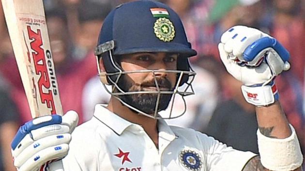 Virat Kohli celebrates after scoring his double century in the one-ff Test match against Bangladesh.(PTI) Virat Kohli celebrates after scoring his double century in the one-ff Test match against Bangladesh.(PTI)