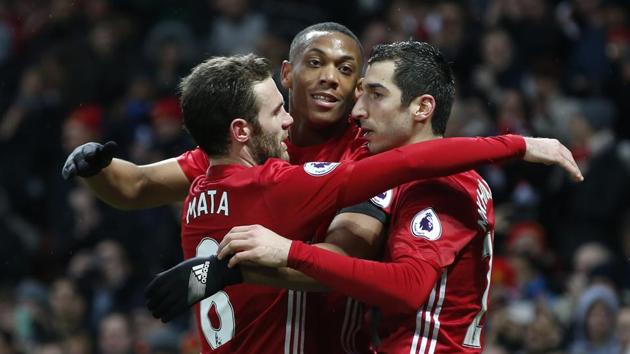 Manchester United's Anthony Martial (centre) celebrates scoring their second goal with Henrikh Mkhitaryan and Juan Mata, against Watford on Saturday.(REUTERS)