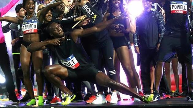 Usain Bolt, an eight-time Olympic champion, celebrates with teammates during the final night of the Nitro Athletics series at the Lakeside Stadium in Melbourne, Australia on Saturday.(Reuters)