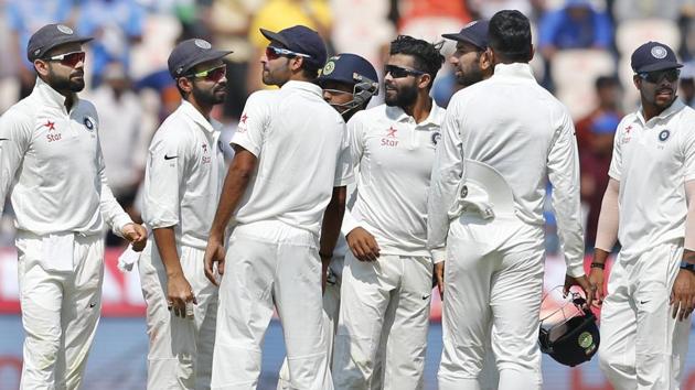 India's Ravindra Jadeja and teammates celebrate the dismissal of Bangladesh's Sabbir Rahman in Hyderabad. Get cricket score of India vs Bangladesh here.(AP)