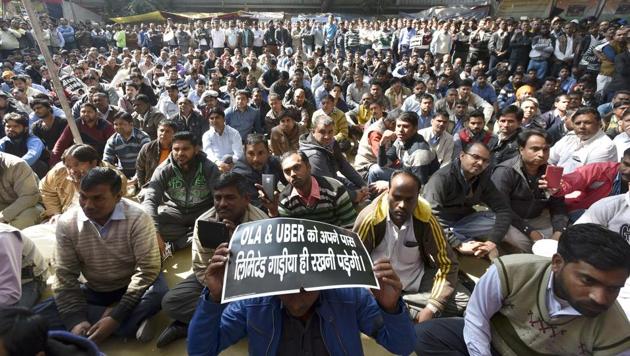 Hundreds of cab drivers on Friday staged a protest against cab aggregators Ola and Uber at Jantar Mantar and threatened a bigger strike from Monday if their demands were not met. (Ravi Choudhary/HT PHOTO) Hundreds of cab drivers on Friday staged a protest against cab aggregators Ola and Uber at Jantar Mantar and threatened a bigger strike from Monday if their demands were not met. (Ravi Choudhary/HT PHOTO)
