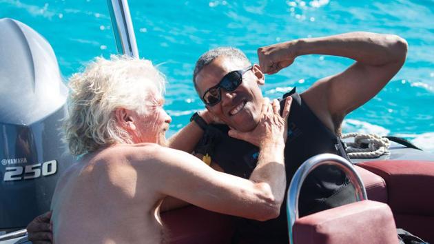 In a recent handout picture released by Virgin on February 7, 2017, former US President Barack Obama (R) is pictured during a kitesurfing session with British billionaire Richard Branson (L), off the coast of Moskito Island in the British Virgin Islands in the Caribbean. (AFP) In a recent handout picture released by Virgin on February 7, 2017, former US President Barack Obama (R) is pictured during a kitesurfing session with British billionaire Richard Branson (L), off the coast of Moskito Island in the British Virgin Islands in the Caribbean. (AFP)