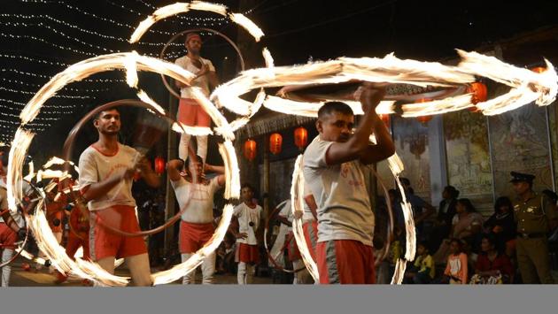 Sri Lankan fire dancers perform in a procession in front of the Gangarama Temple during the Navam Perahera festival in Colombo. Monks, drummers, dancers and some 50 trained elephants, mostly from central part of the island, thronged to Colombo from various regions of Sri Lanka to participate in the city's biggest two-day annual Buddhist procession starting February 9. (LAKRUWAN WANNIARACHCHI / AFP) Sri Lankan fire dancers perform in a procession in front of the Gangarama Temple during the Navam Perahera festival in Colombo. Monks, drummers, dancers and some 50 trained elephants, mostly from central part of the island, thronged to Colombo from various regions of Sri Lanka to participate in the city's biggest two-day annual Buddhist procession starting February 9. (LAKRUWAN WANNIARACHCHI / AFP)