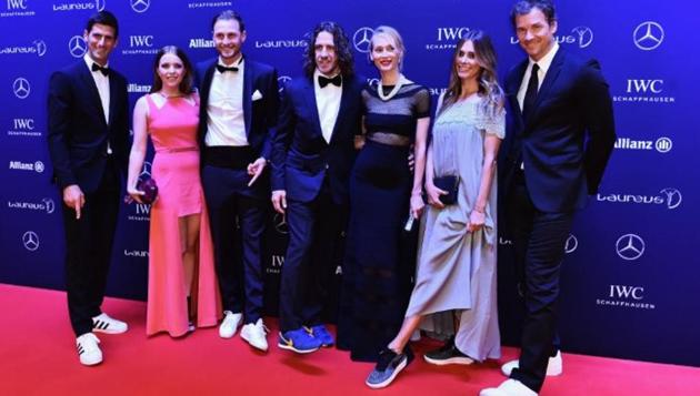 Novak Djokovic (extreme left), Carles Puyol (4th from left) at last year’s Laureus World Sports Awards wearing sneakers. (Laureus) Novak Djokovic (extreme left), Carles Puyol (4th from left) at last year’s Laureus World Sports Awards wearing sneakers. (Laureus)