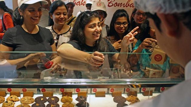 The group participates in a cookie tasting at Oh Dough as part of the HT Kala Ghoda Arts Festival on Saturday.(Satyabrata Tripathy/HT)