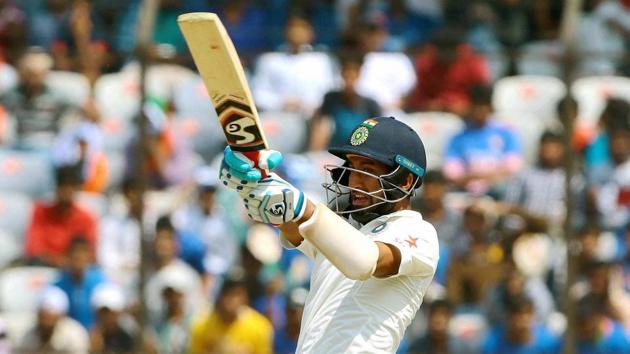 India cricket team’s Cheteshwar Pujara pulls one to the ropes during his quick-fire innnings against Bangladesh cricket team on Sunday.(PTI)