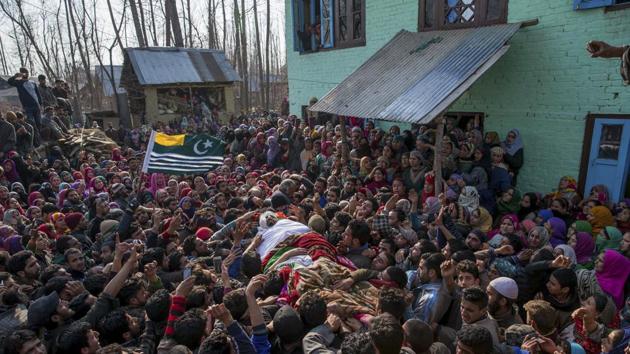 Kashmiri villagers carry body of Mudasir Ahmed, one among four suspected rebels killed at his residence in Redwani, 65 km south of Srinagar in Kashmir on Sunday.(AP Photo)
