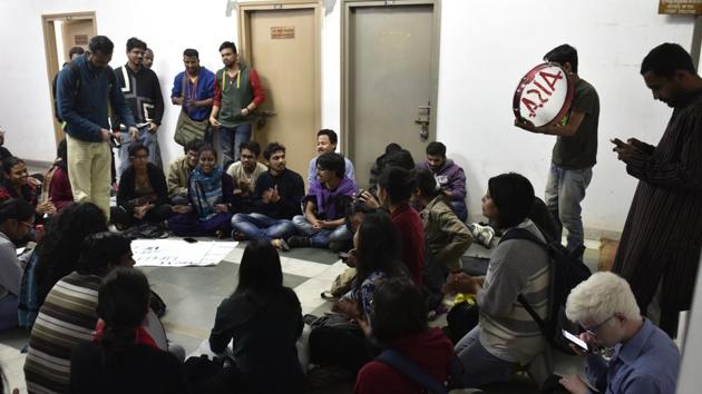 Students protest outside director admissions Milap Punia’s office in the administrative block. (Sushil Kumar/HT Photo) Students protest outside director admissions Milap Punia’s office in the administrative block. (Sushil Kumar/HT Photo)