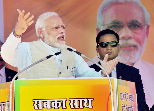 Prime Minister Narendra Modi addresses BJP supporters during the Vijay Sankalp rally at Srinagar in Uttarakhand on Sunday. (PTI) Prime Minister Narendra Modi addresses BJP supporters during the Vijay Sankalp rally at Srinagar in Uttarakhand on Sunday. (PTI)