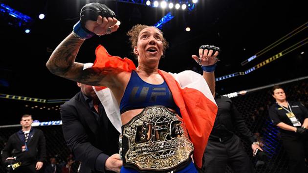 Germaine de Randamie celebrates her victory over Holly Holm in their women's featherweight championship bout during the UFC 208 event.(Zuffa LLC via Getty Images) Germaine de Randamie celebrates her victory over Holly Holm in their women's featherweight championship bout during the UFC 208 event.(Zuffa LLC via Getty Images)