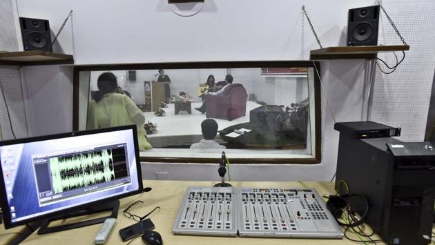 Live studio at AlI India Radio (AIR) office, in New Delhi. AIR was the first to introduce hourly news bulletins in the ’80s. The ’90s was the time when Prasar Bharti Corporation took control of AIR and Doordarshan (DD). AIR also began to face competition from private radio stations. (Sanjeev Verma / HT photo)