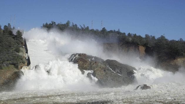 Water flows down Oroville Dam's main spillway, near Oroville.(AP Photo)