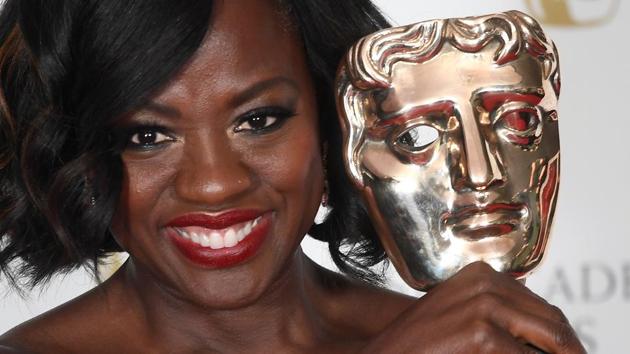 Viola Davis holds her award for best supporting actress for Fences. (REUTERS)