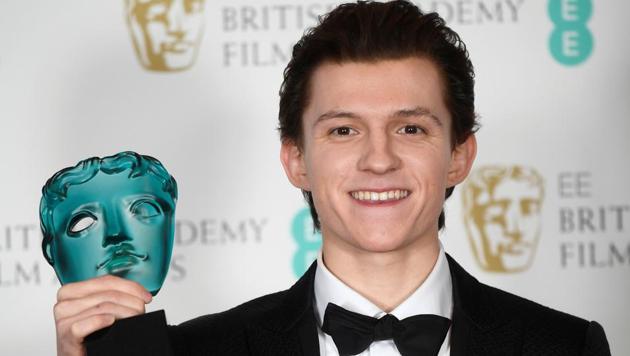 Tom Holland holds the Rising Star award. (REUTERS)