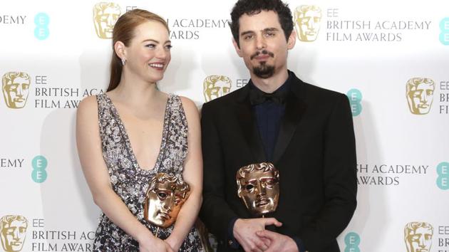 Actress Emma Stone with her BAFTA award for Best Actress and director Damien Chazelle with his BAFTA award for Best Director both for the film La La Land. (AP)