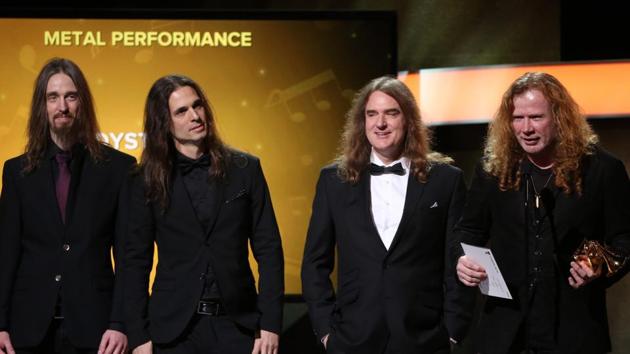 Megadeath accept the Grammy for Best Metal Performance for Dystopia at the Grammy Awards. (REUTERS)