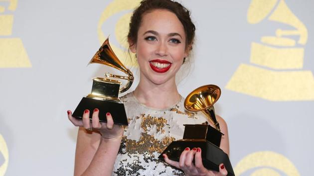 Sarah Jarosz holds her awards for Best Folk Album and Best American Roots Performance. (REUTERS)