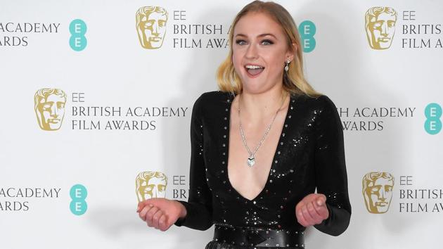 Sophie Turner poses after presenting an award. (REUTERS)
