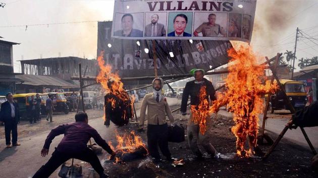 Protesters burn effigies of Nagaland chief minister TR Zeliang, and other ministers during a protest against the killing of two youth in January. (PTI File) Protesters burn effigies of Nagaland chief minister TR Zeliang, and other ministers during a protest against the killing of two youth in January. (PTI File)