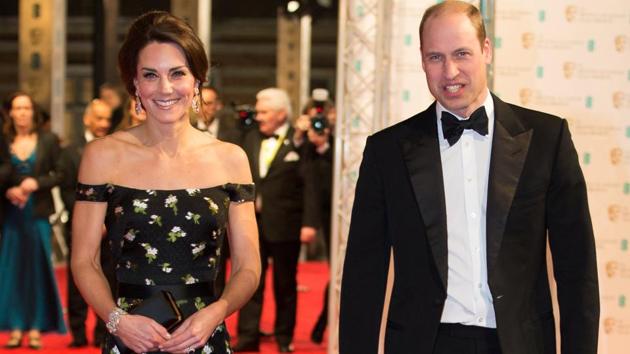 Britain's Prince William, Duke of Cambridge (left) and Britain's Catherine, Duchess of Cambridge, arrive at the BAFTA venue. (REUTERS)