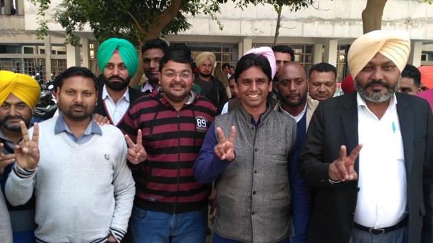 AAP’s Mehrauli MLA Naresh Yadav (right) coming out of a court in Sangrur on Monday.(HT Photo)