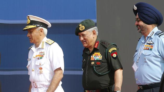 Indian Army Chief Bipin Rawat (centre), Air Force Chief Birender Singh Dhanoa (right), and Navy Chief Sunil Lanba arrive at the opening ceremony of Aero India 2017. Aero India is a biennial event with flying demonstrations by stunt teams and militaries and commercial pavilions where aviation companies display their products and technology. (AP) Indian Army Chief Bipin Rawat (centre), Air Force Chief Birender Singh Dhanoa (right), and Navy Chief Sunil Lanba arrive at the opening ceremony of Aero India 2017. Aero India is a biennial event with flying demonstrations by stunt teams and militaries and commercial pavilions where aviation companies display their products and technology. (AP)