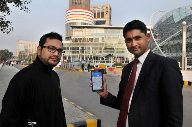 Yogesh Ojha (right), manager of Ninkasi, uses Google Maps to check the motor able distance from the highway to his establishment in DT Star Mall, Sector 30, Gurgaon, on Tuesday. (Parveen Kumar/HT Photos) Yogesh Ojha (right), manager of Ninkasi, uses Google Maps to check the motor able distance from the highway to his establishment in DT Star Mall, Sector 30, Gurgaon, on Tuesday. (Parveen Kumar/HT Photos)