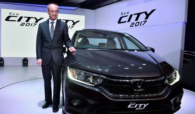 New Delhi: Chief Executive and President of Honda Cars India Ltd, Yoichiro Ueno at the launch of Honda city 2017 in New Delhi on Tuesday.(PTI)