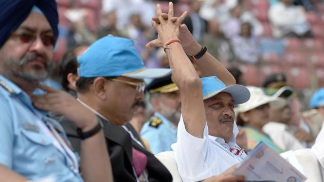 (Right to left ) Indian defense minister Manohar Parrikar, National Security Advisor Ajit Doval, and Air Chief Marshal of the Indian Airforce Birender Singh Dhanoa watch the Surya Kirans aerobatic team of the Indian Air Force during an aerial display over the skies of Yelahanka Air Force Station. (AFP) (Right to left ) Indian defense minister Manohar Parrikar, National Security Advisor Ajit Doval, and Air Chief Marshal of the Indian Airforce Birender Singh Dhanoa watch the Surya Kirans aerobatic team of the Indian Air Force during an aerial display over the skies of Yelahanka Air Force Station. (AFP)