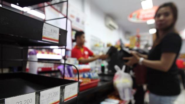 A condom rack is left empty at a convenience store in Makassar, South Sulawesi province, in Indonesia on Valentine’s day. Indonesian authorities raided convenience stores and seized condoms in a major city to stop teenagers having casual sex on the day. (AFP) A condom rack is left empty at a convenience store in Makassar, South Sulawesi province, in Indonesia on Valentine’s day. Indonesian authorities raided convenience stores and seized condoms in a major city to stop teenagers having casual sex on the day. (AFP)