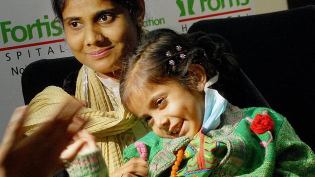 The five-year-old girl from Pakistan, Anabiya, who underwent a successful liver transplant at a hospital in Noida on Wednesday. (PTI) The five-year-old girl from Pakistan, Anabiya, who underwent a successful liver transplant at a hospital in Noida on Wednesday. (PTI)