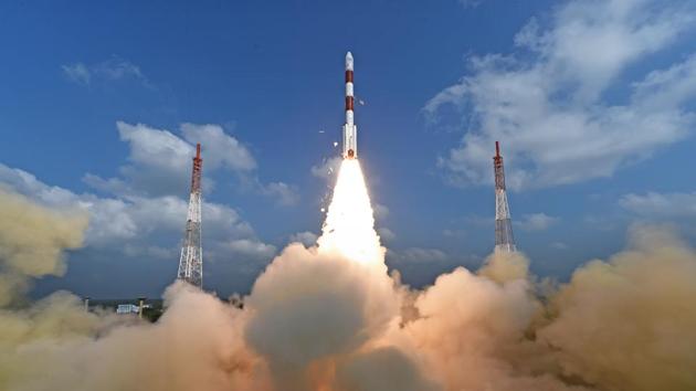 A ground view of Isro’s rocket shooting into the sky, carrying a 1378kg payload. India successfully put a record 104 satellites from a single rocket into orbit on February 15 in the latest triumph for its famously frugal space agency. (isro.gov.in)