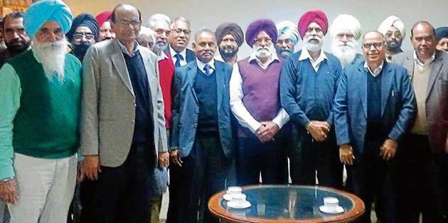 Members of the Punjabi University Re-employed Professors Association holding a meeting on the university campus in Patiala on Wednesday. (HT Photo) Members of the Punjabi University Re-employed Professors Association holding a meeting on the university campus in Patiala on Wednesday. (HT Photo)