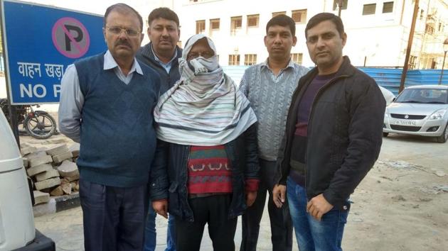 Chander Mohan Gupta (face covered) after his arrest from Chandni Chowk. Gupta allegedly drugged people and stole their belongings. Chander Mohan Gupta (face covered) after his arrest from Chandni Chowk. Gupta allegedly drugged people and stole their belongings.
