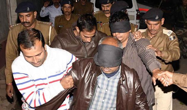 Members of the special investigation team of Patna police with the arrested accused of BSSC paper leak case, in Patna. (Santosh Kumar/HT file photo) Members of the special investigation team of Patna police with the arrested accused of BSSC paper leak case, in Patna. (Santosh Kumar/HT file photo)