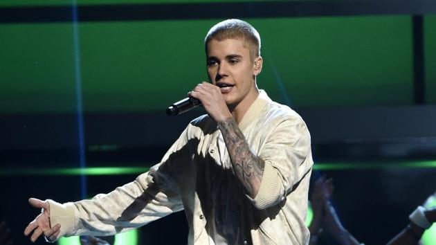 According to sources, Bieber will fly in with an entourage of 150 people, including backup dancers and choreographers. (AP)