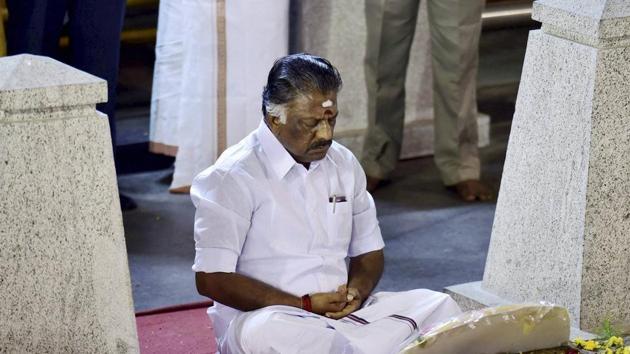 Tamil Nadu’s acting chief minister O Panneerselvam meditates at J Jayalalithaa’s memorial at the Marina Beach in Chennai.(PTI) Tamil Nadu’s acting chief minister O Panneerselvam meditates at J Jayalalithaa’s memorial at the Marina Beach in Chennai.(PTI)