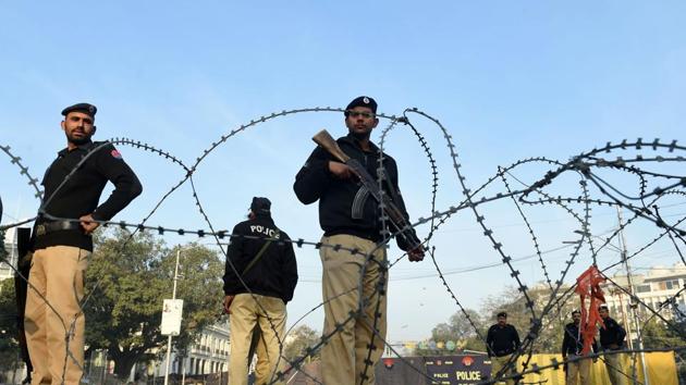 Police cordon off the site of a suicide bombing in Lahore. At least 16 people were killed when a suicide blast ripped through a protest in Lahore. (AFP Photo)