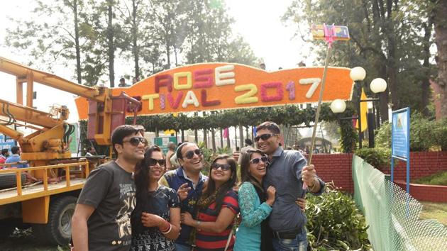 People taking a selfie at the entrance of the garden. (Sanjeev Sharma/HT Photo) 