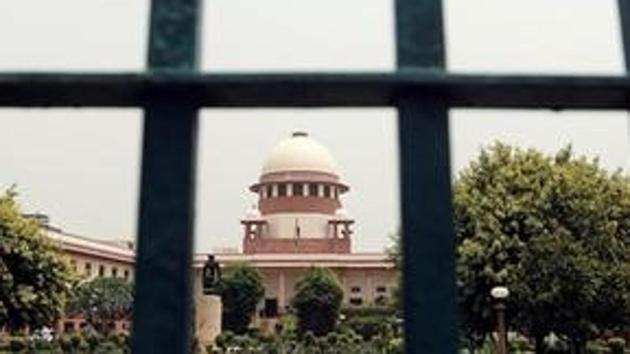 The Supreme Court is pictured through a gate in New Delhi. (Reuters) The Supreme Court is pictured through a gate in New Delhi. (Reuters)