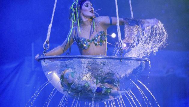 An artist performs sitting inside a transparent bowl full of water at a new circus show called "Circus on Water" in Kiev, Ukraine, February 16, 2017. (Efrem Lukatsky/AP Photo) An artist performs sitting inside a transparent bowl full of water at a new circus show called "Circus on Water" in Kiev, Ukraine, February 16, 2017. (Efrem Lukatsky/AP Photo)