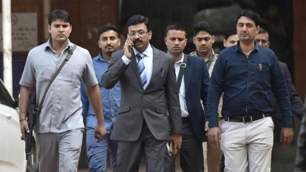 New Delhi, India - Feb. 16, 2017: Sanjeev Kumar Yadav ( C ) DCP (Special Cell) leaves Patiala court after two of the accused in the 2005 Delhi serial blasts case are acquitted. One of the accused is sentenced to 10 years in prison.(Vipin Kumar/HT PHOTO)